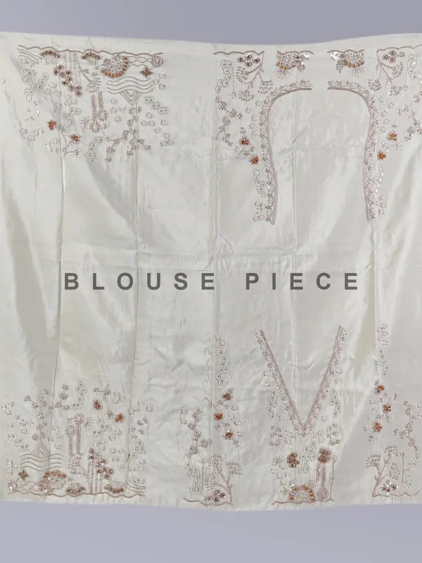 Cream silk lehenga choli with pearls and cutdana work