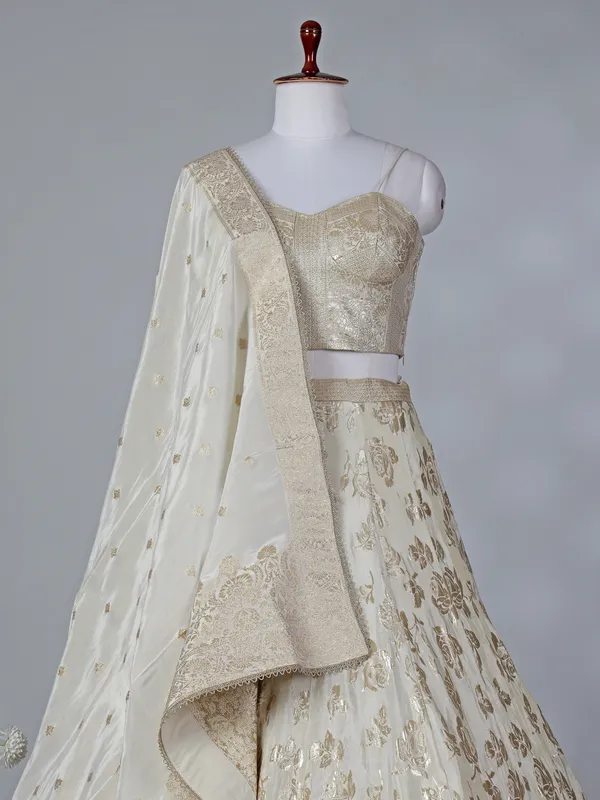 Cream silk lehenga choli with sleeveless choli