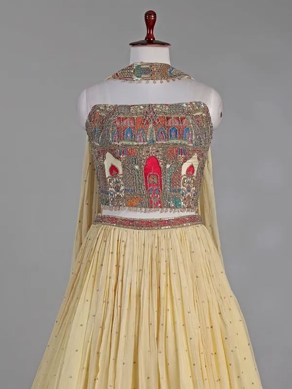 Cream silk lehenga choli with zardosi highlights