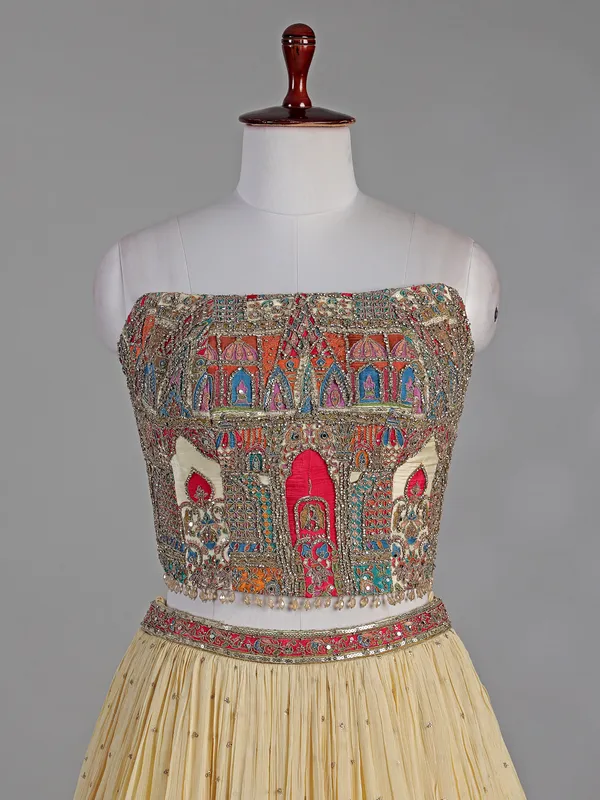 Cream silk lehenga choli with zardosi highlights