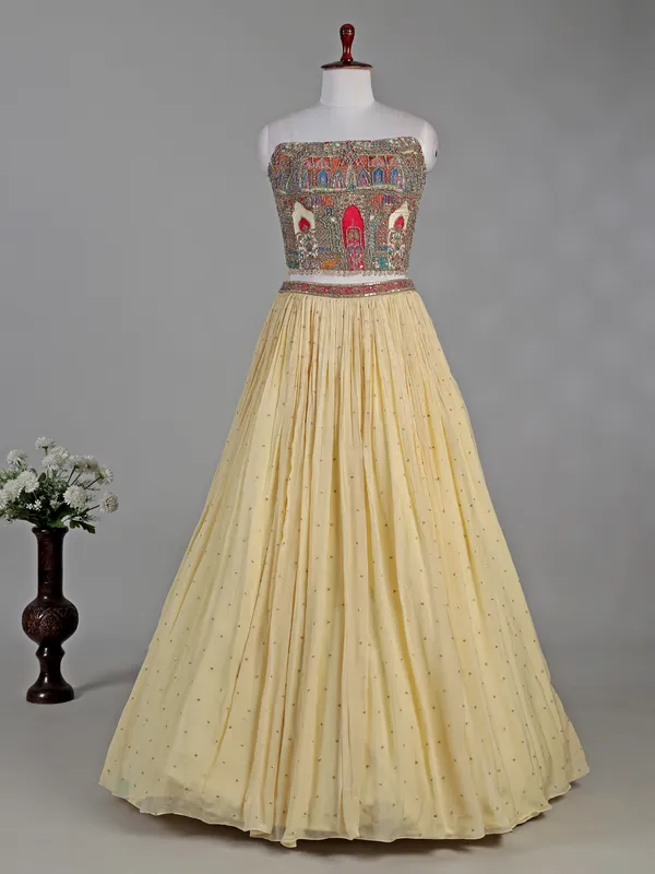 Cream silk lehenga choli with zardosi highlights