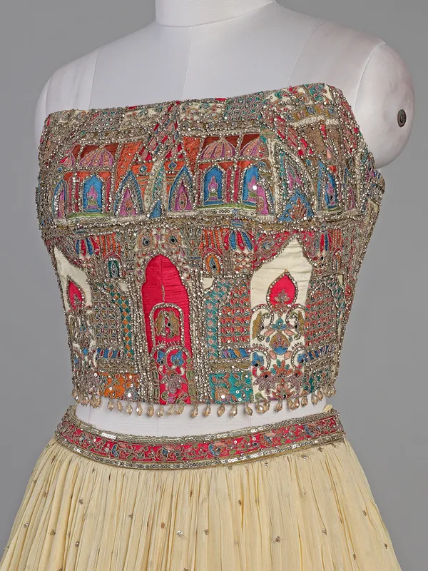 Cream silk lehenga choli with zardosi highlights