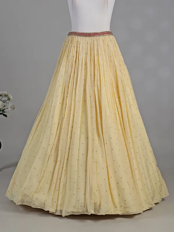 Cream silk lehenga choli with zardosi highlights
