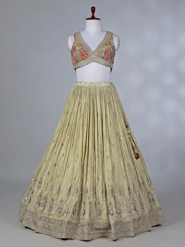 Cream silk lehenga choli with zardosi work