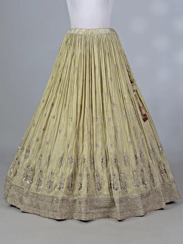 Cream silk lehenga choli with zardosi work