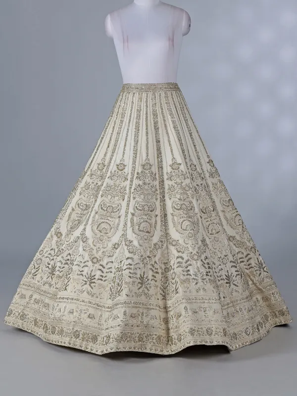 Cream silk lehenga with resham and sequins work