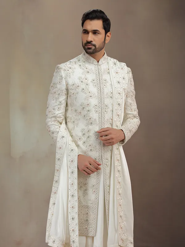 Cream silk peshwa style sherwani with dupatta for groom