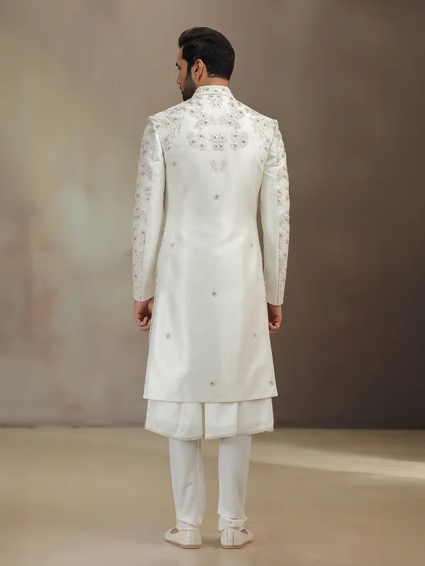 Cream silk peshwa style sherwani with dupatta for groom