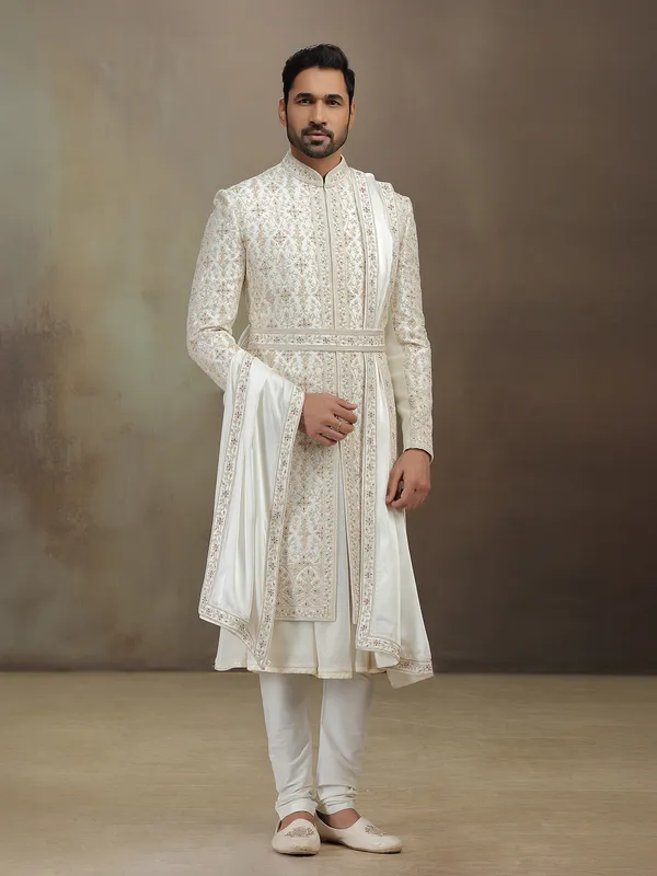 Cream silk peshwai groom sherwani with dupatta