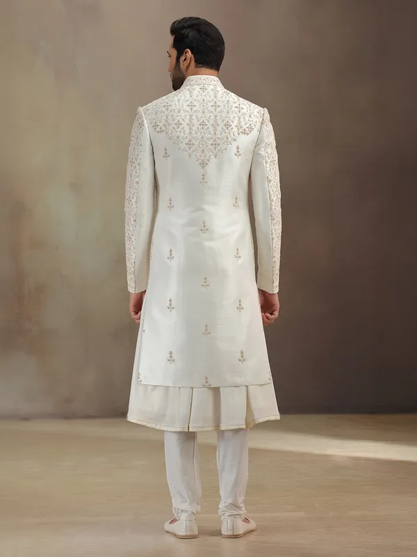 Cream silk peshwai groom sherwani with dupatta