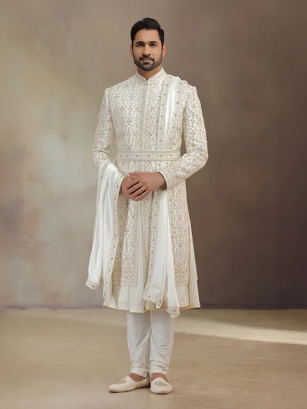 Cream silk peshwai groom sherwani with dupatta