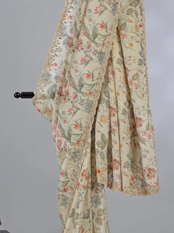 Cream silk printed saree with zardosi touch