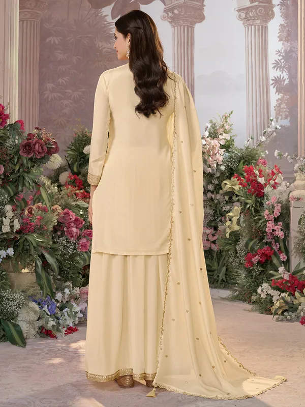 Cream silk salwar suit with dupatta for festive wear