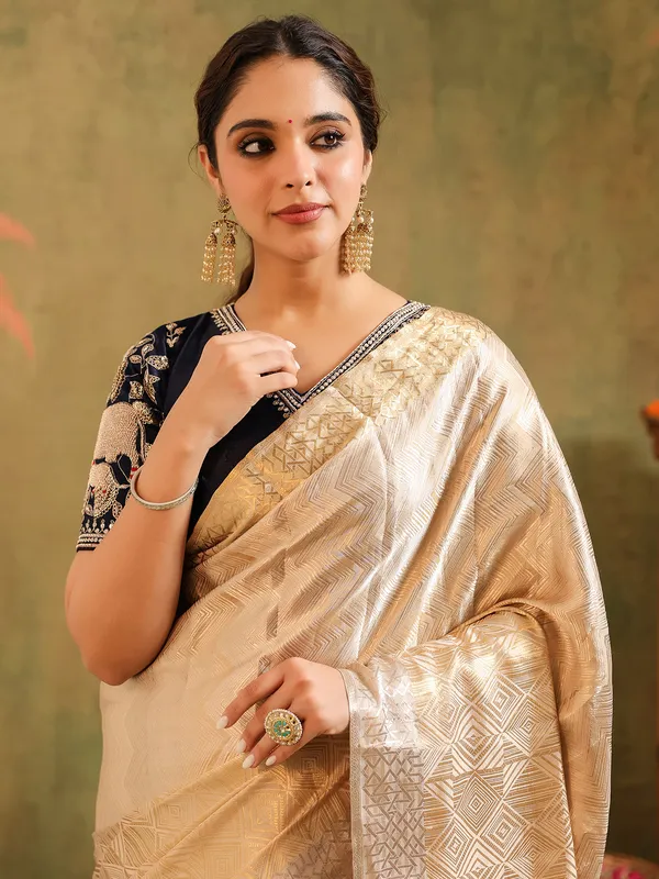 Cream silk saree designed for wedding