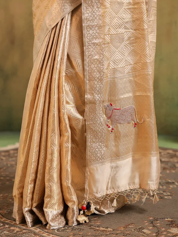 Cream silk saree designed for wedding