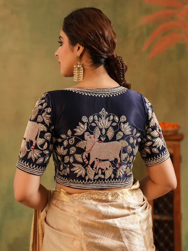 Cream silk saree designed for wedding