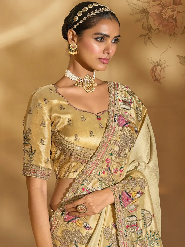 Cream silk saree for festive celebration