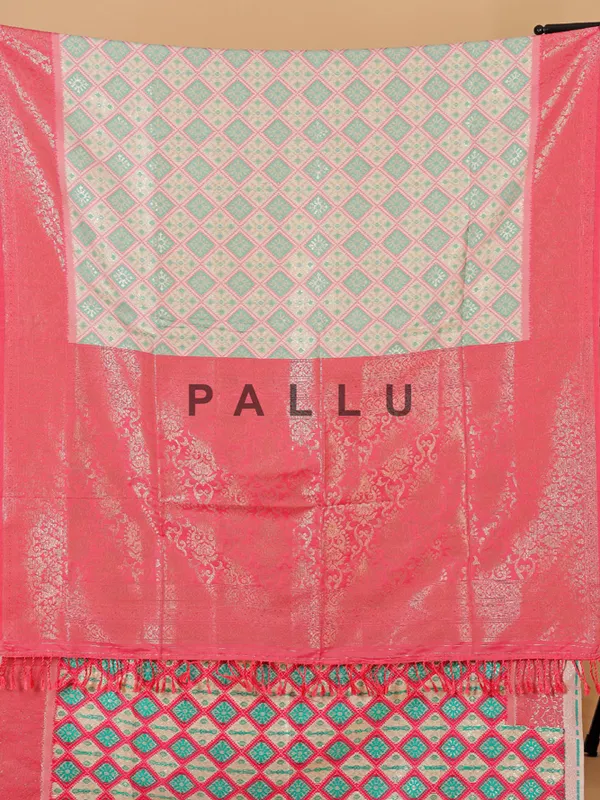Cream silk saree with bold pallu