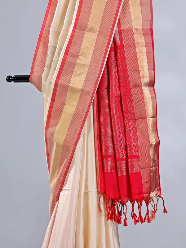Cream silk saree with fine zari weaving for weddings