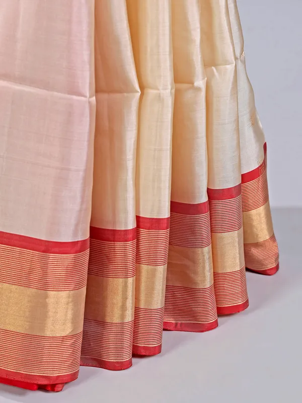 Cream silk saree with fine zari weaving for weddings