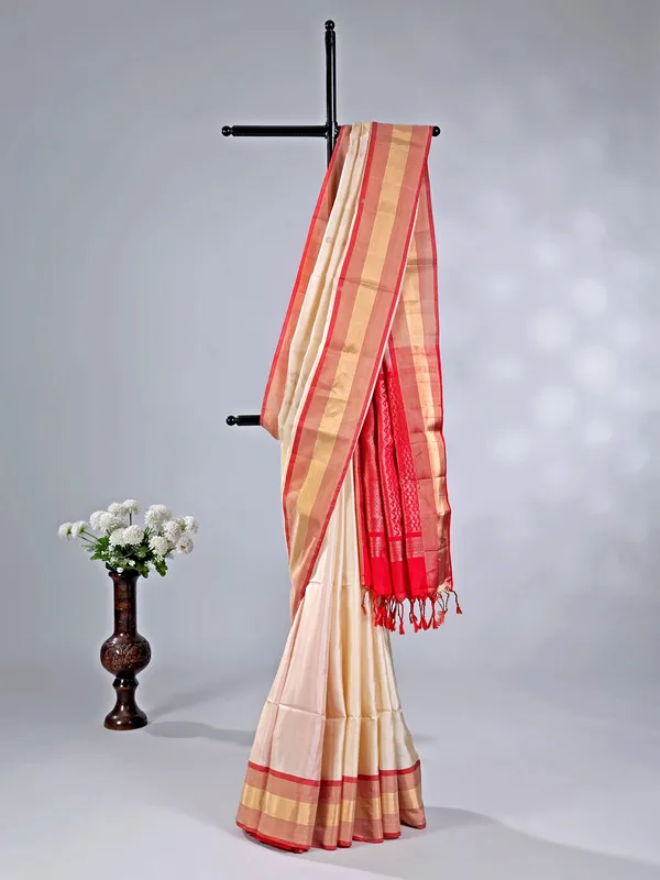 Cream silk saree with fine zari weaving for weddings