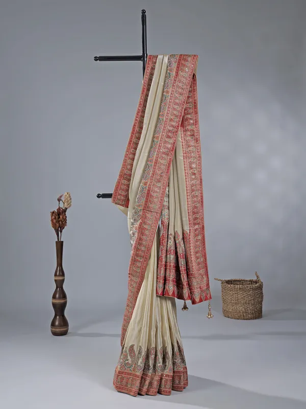 Cream silk saree with lustrous zari craftsmanship