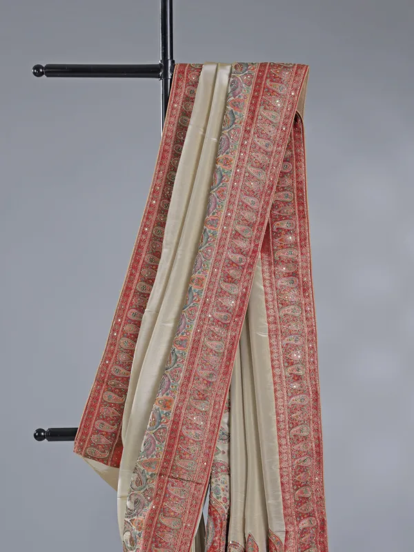 Cream silk saree with lustrous zari craftsmanship