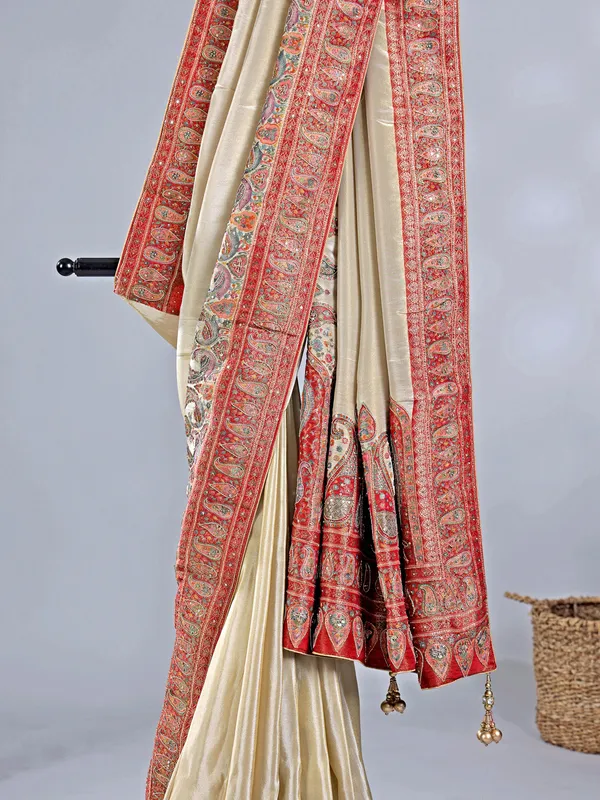Cream silk saree with lustrous zari craftsmanship