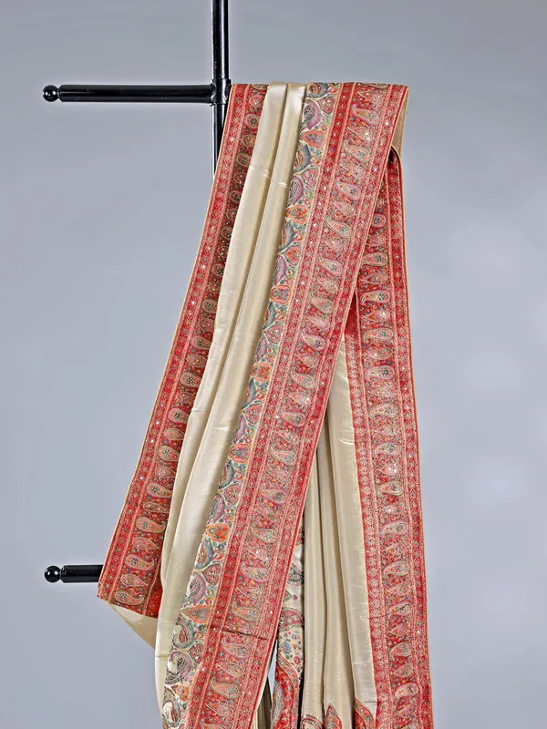 Cream silk saree with lustrous zari craftsmanship