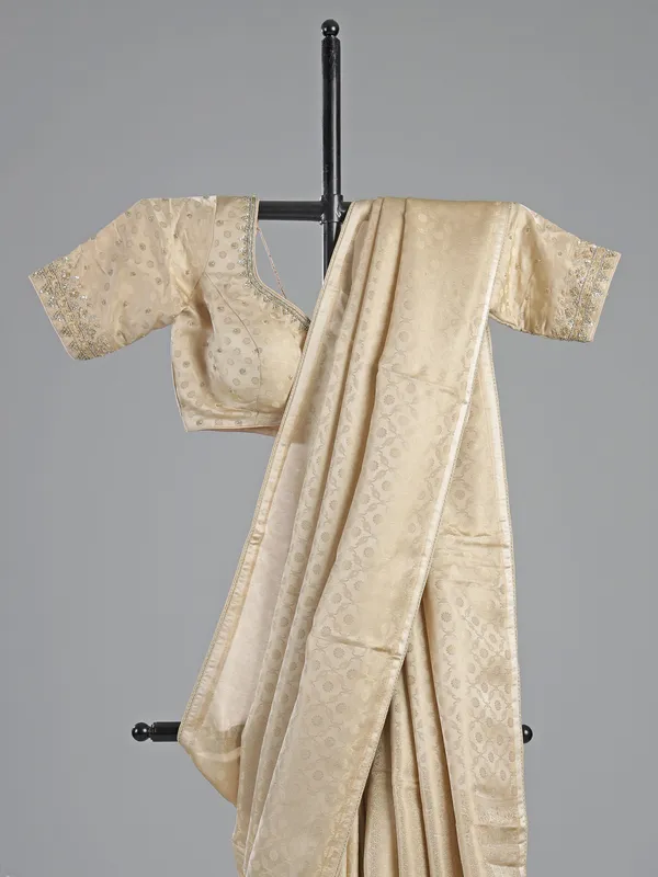 Cream silk saree with readymade work blouse