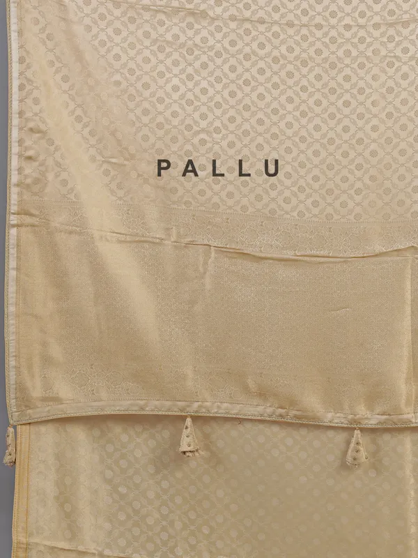 Cream silk saree with readymade work blouse