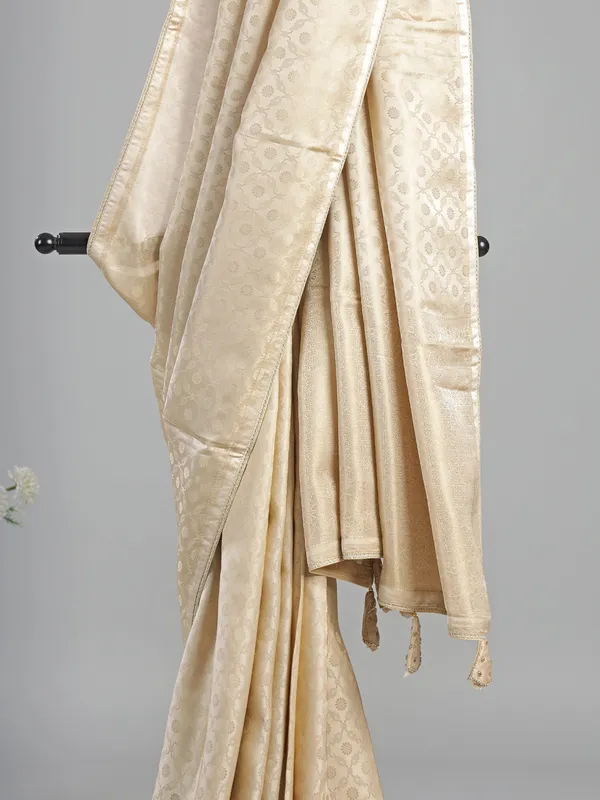Cream silk saree with readymade work blouse