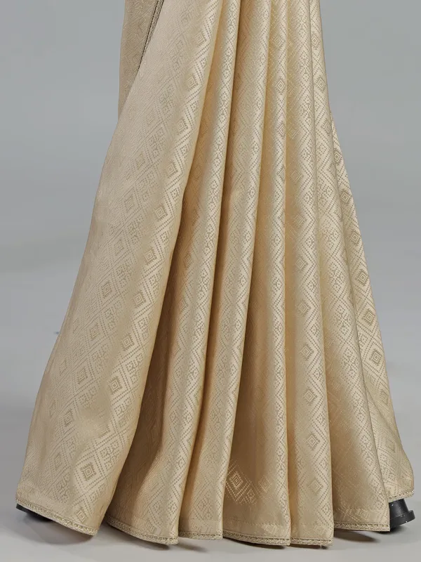 Cream silk saree with zardosi detailing