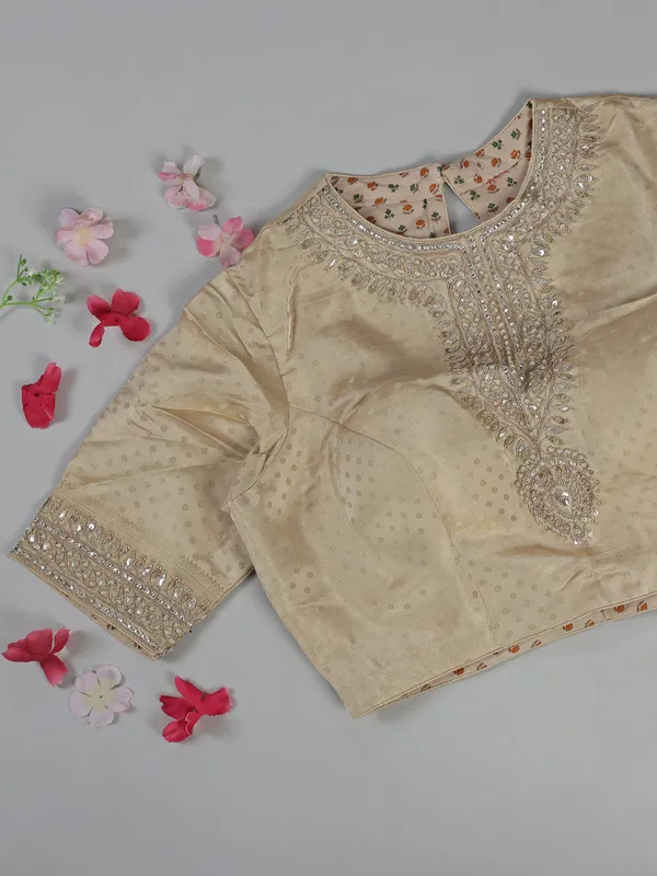 Cream silk saree with zardosi detailing