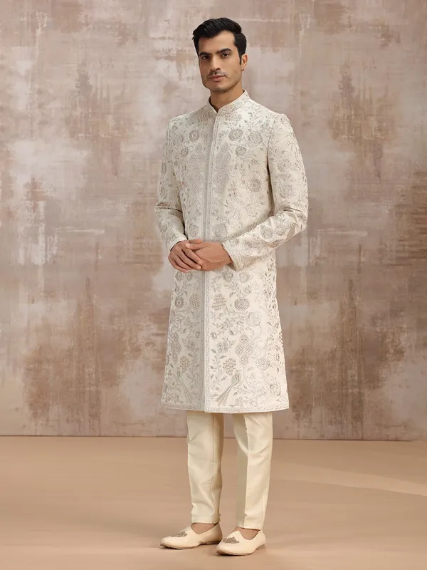 Cream silk sherwani featuring fine embroidery