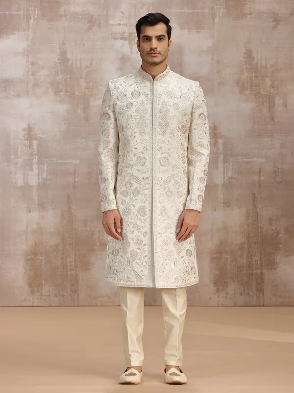 Cream silk sherwani featuring fine embroidery