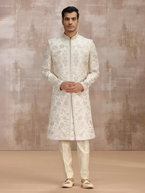 Cream silk sherwani featuring fine embroidery
