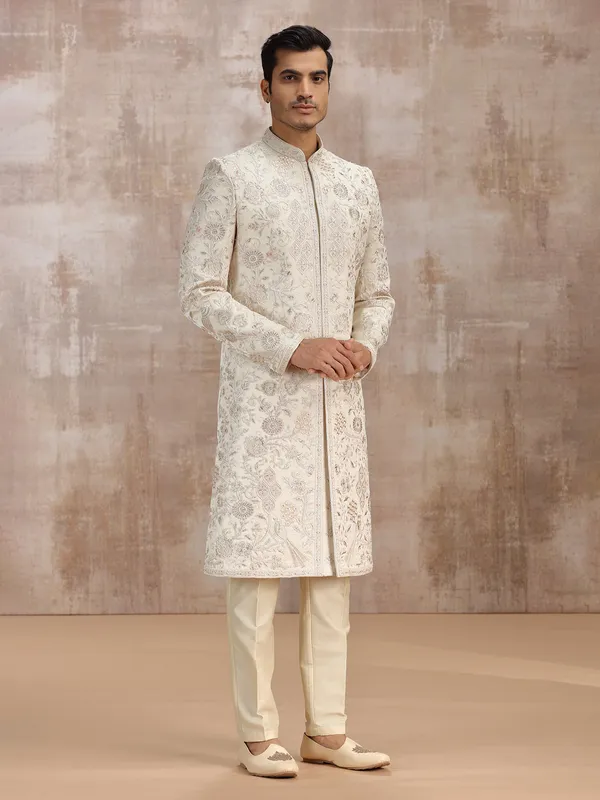Cream silk sherwani featuring fine embroidery