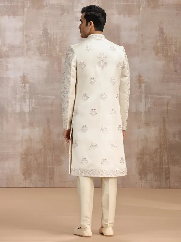 Cream silk sherwani featuring fine embroidery