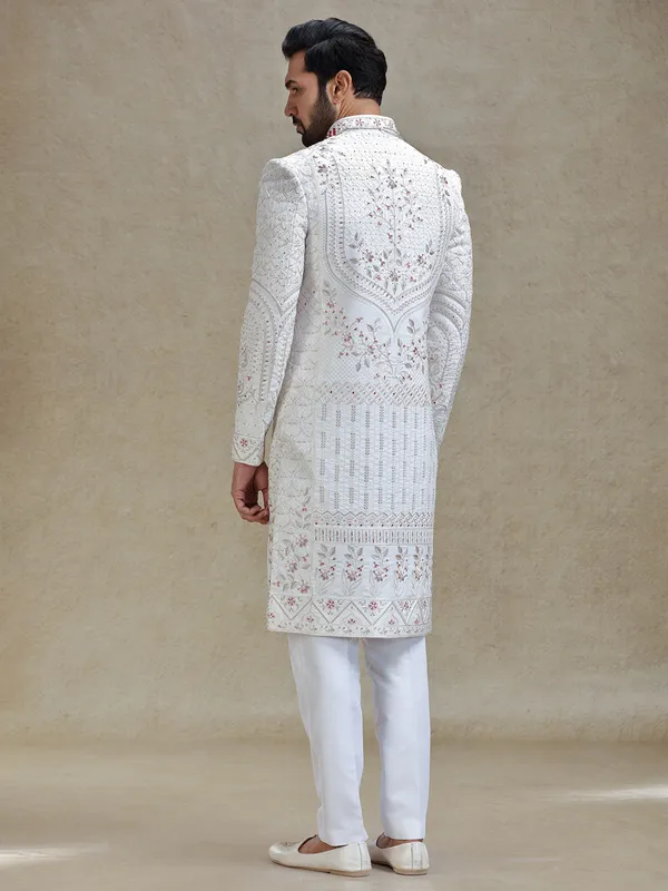 Cream silk sherwani in rich embellishment