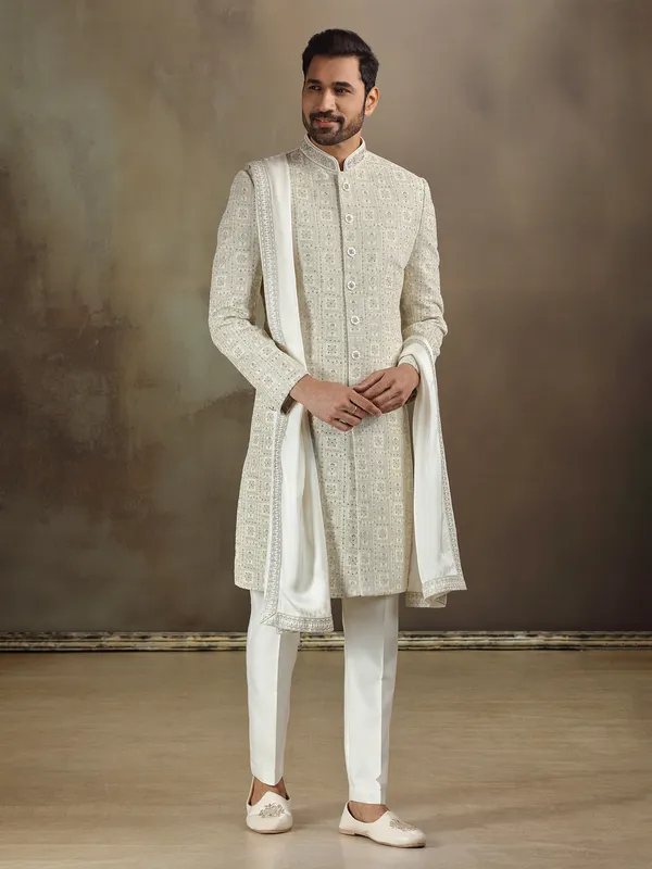 Cream silk sherwani with beautiful weaving