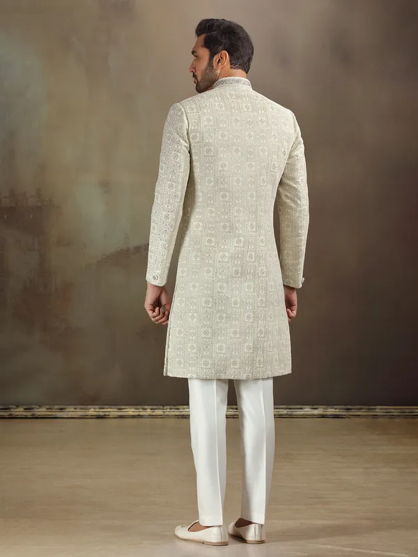 Cream silk sherwani with beautiful weaving
