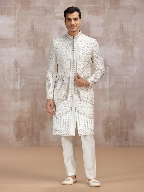 Cream silk sherwani with elegant resham detailing