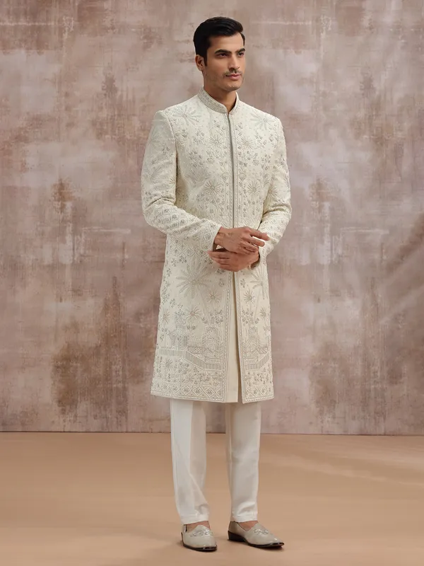 Cream silk wedding sherwani with cutdana embellishment