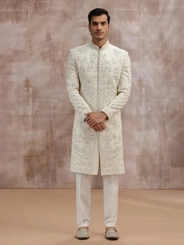 Cream silk wedding sherwani with cutdana embellishment