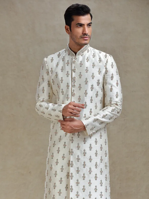 Cream  silk wedding style long jacket sherwani set