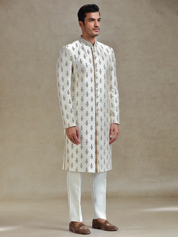 Cream  silk wedding style long jacket sherwani set