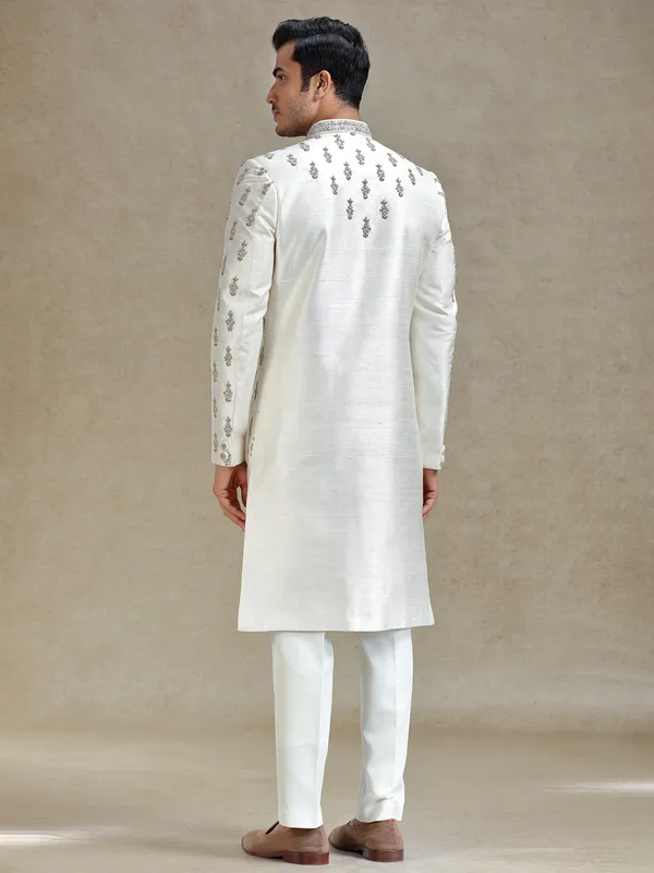 Cream  silk wedding style long jacket sherwani set