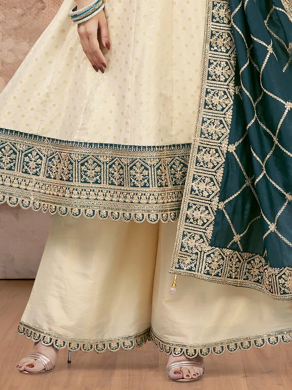 Cream silk wedding wear palazzo suit with dupatta