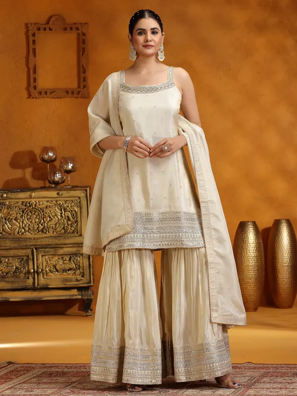 Cream silk wedding wear sharara suit with dupatta